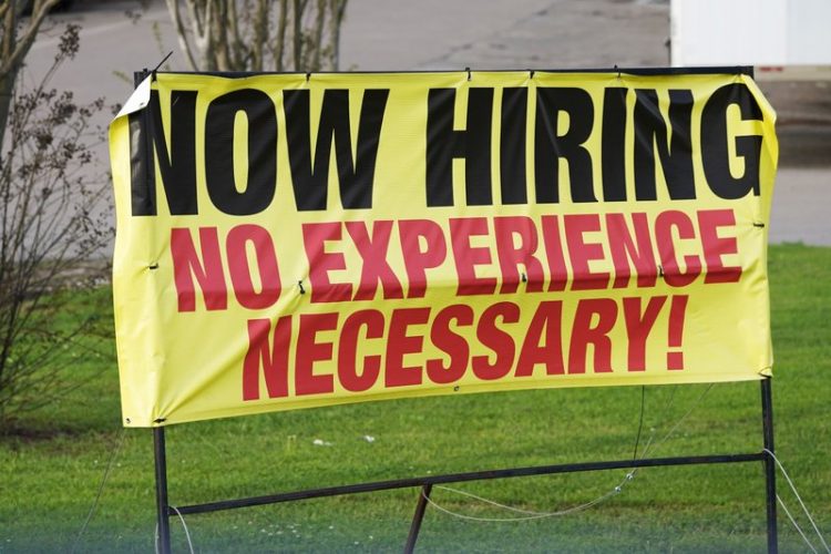 US employers add 916,000 jobs in March as hiring accelerates